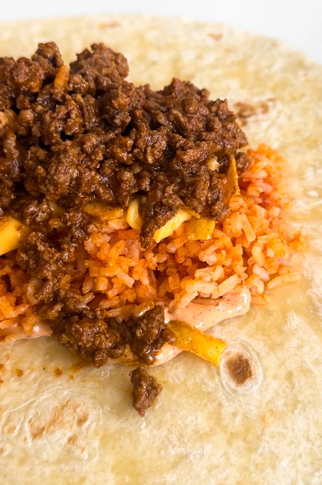 Grilled Cheese Burrito With Spanish Rice and Chipotle Sauce